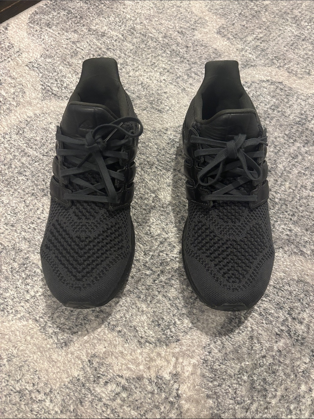 Men’s black adidas ultra boost sneakers